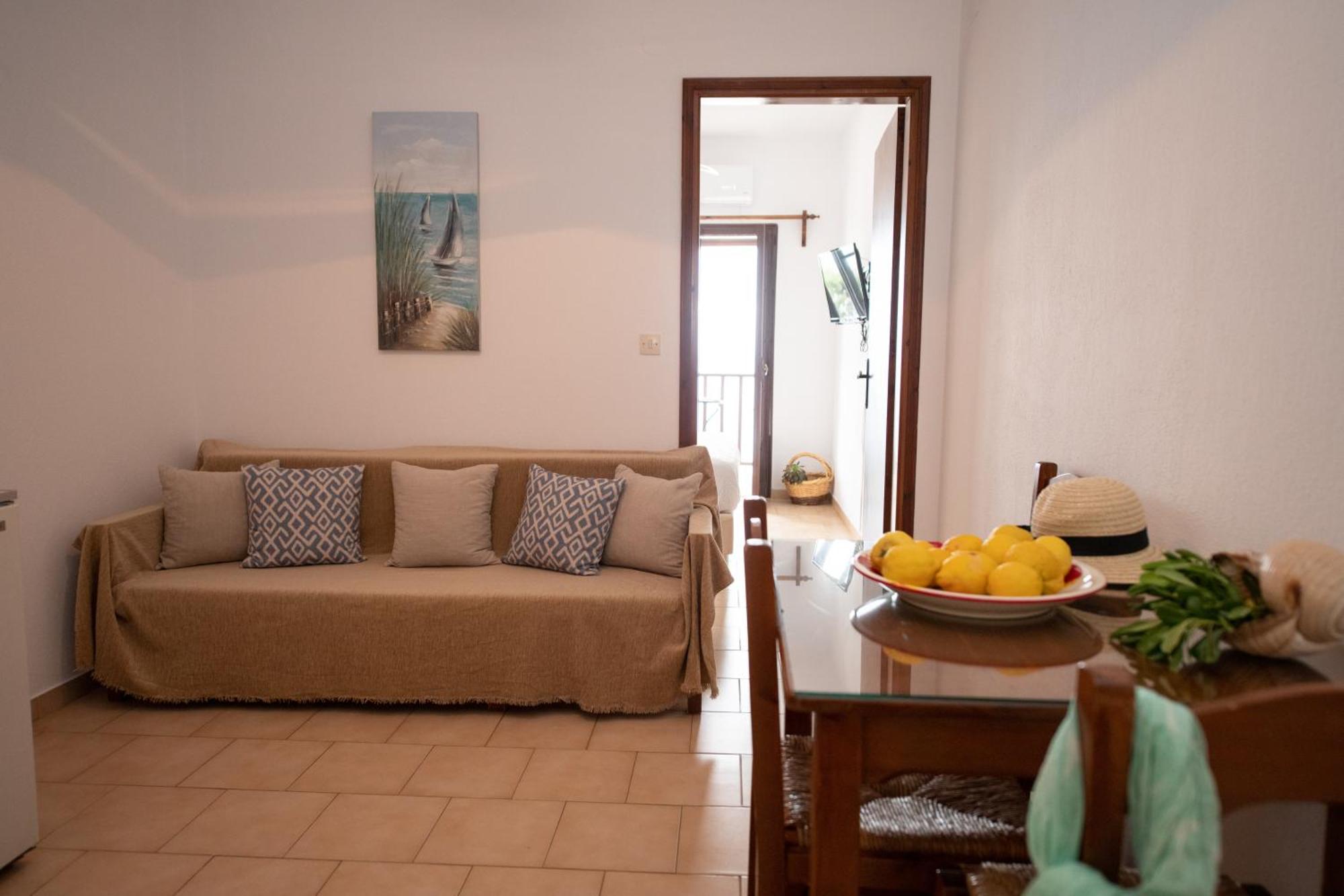 Lilian Beachfront Apartments Neo Klima Bagian luar foto